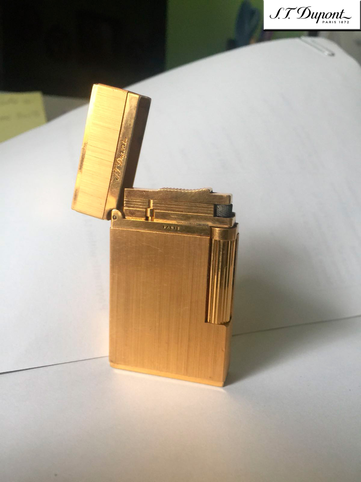 S. T. Dupont 1FKCE82 Gold Lighter.Used.  www.a2900.com  a2900 store Online. Canada. USA. S. T. Dupont 1FKCE82 Запальничка золота. Що була у використанні. S. T. Dupont 1FKCE82 Зажигалка золотая. Бывшая в употреблении. 